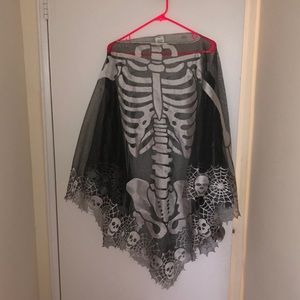 Skeleton lace poncho